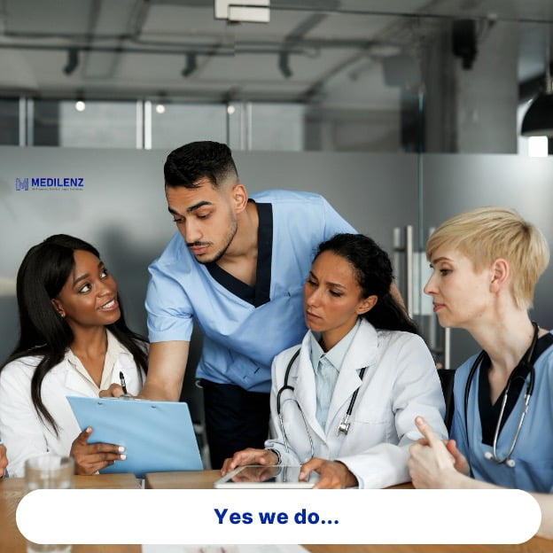 Team of MD physicians reviewing AI-generated medical summaries together, demonstrating Medilenz's blended approach of AI efficiency and expert clinical validation.